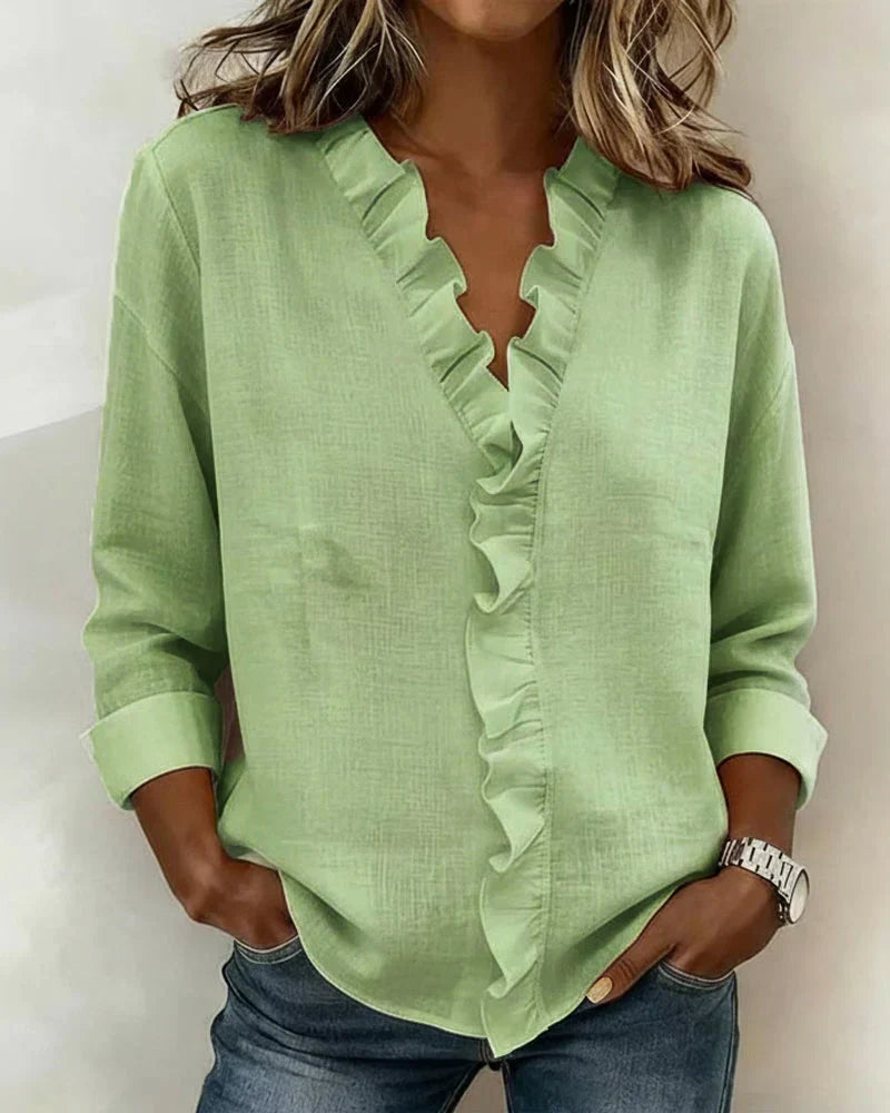 AIRA™|RUFFLED V-NECK BLOUSE