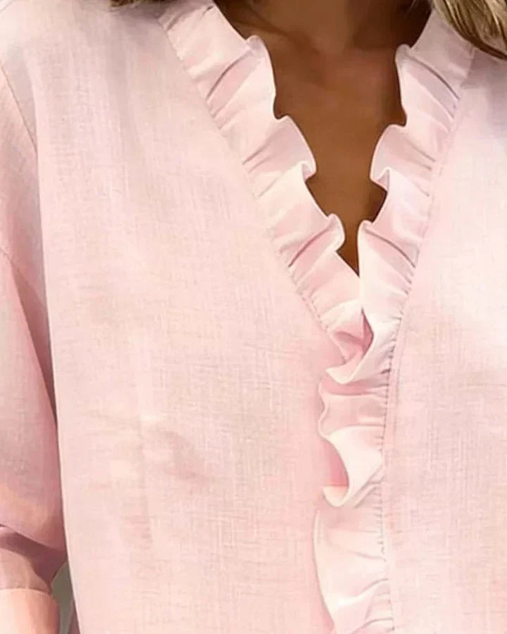 AIRA™|RUFFLED V-NECK BLOUSE